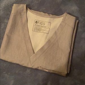 Unworn figs top. Got the wrong size usual a XS.